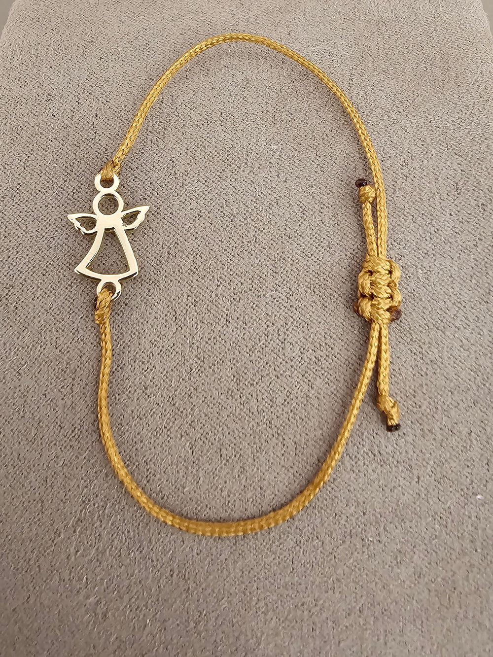 Engelarmband mit Stoffband – 750 Gelbgold